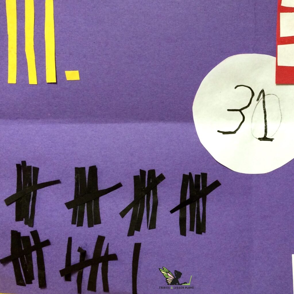 Number thirty-one represented in black construction paper tally marks.